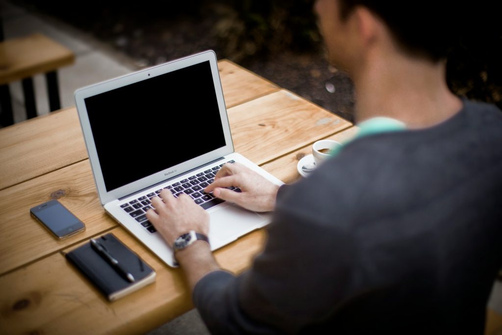 Photo by Alejandro Escamilla man in front of laptop computer in shallow focus photography
